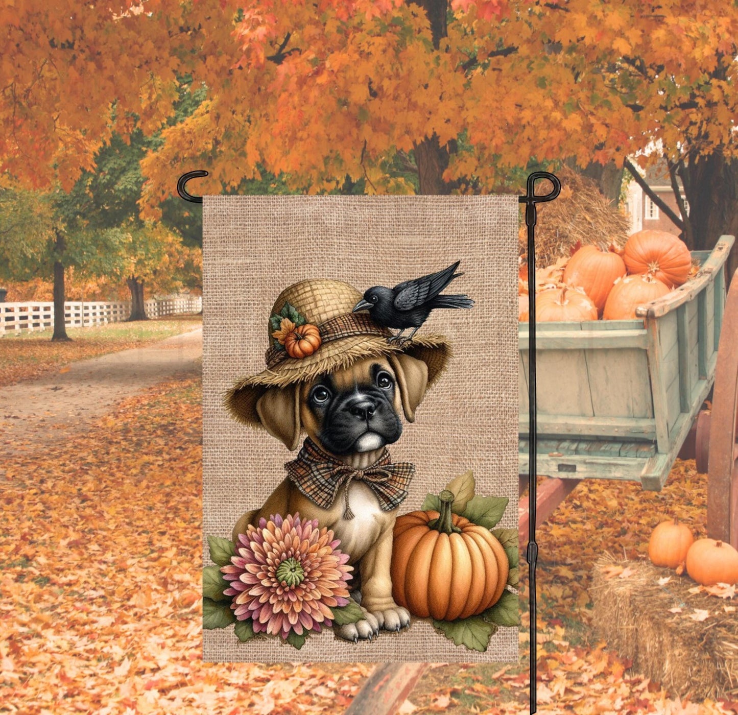 An adorable Boxer Puppy Dog dressed as a Scarecrow.