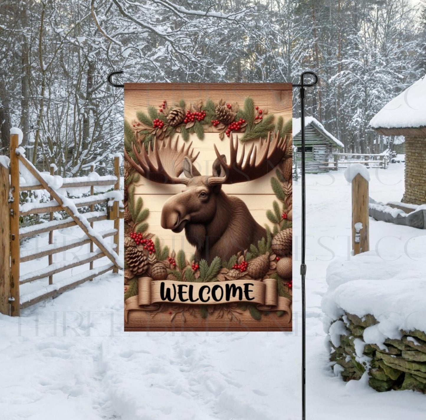 A beautiful Welcome Garden Flag with a Moose in a Winter woodland setting.