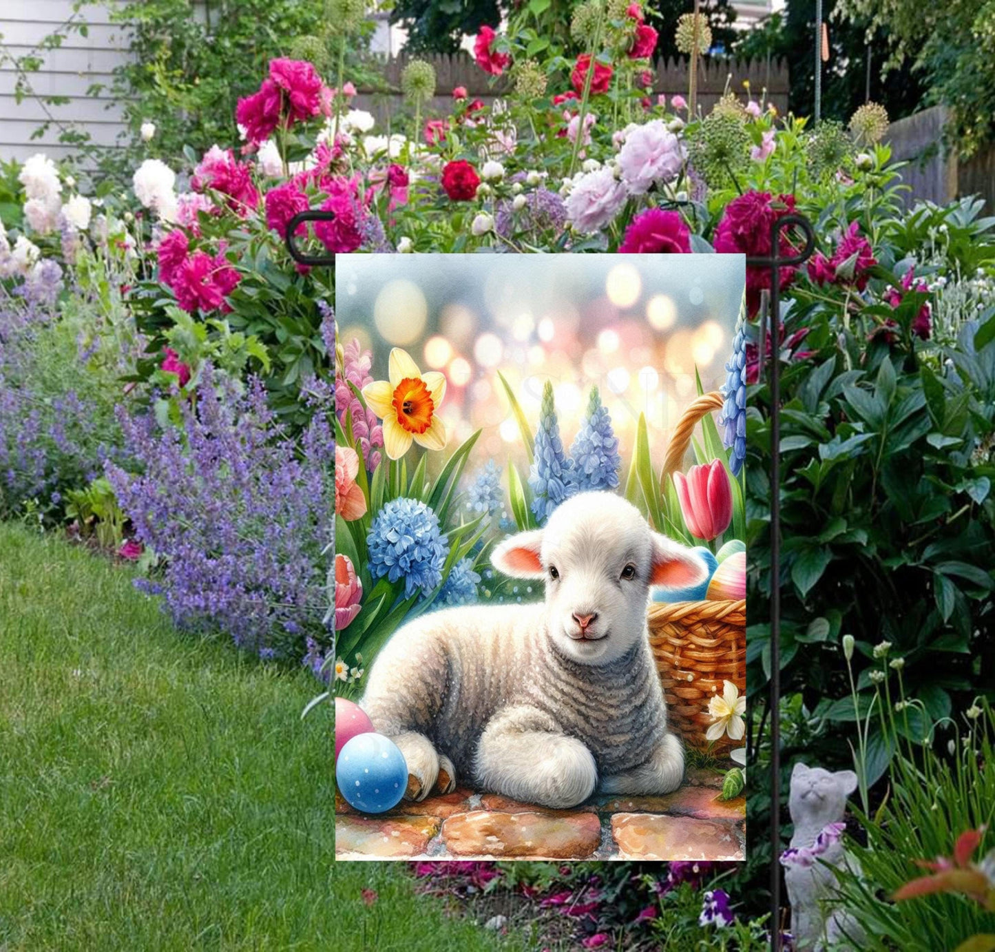 An adorable Easter Lamb surrounded by Easter Eggs and Spring flowers.