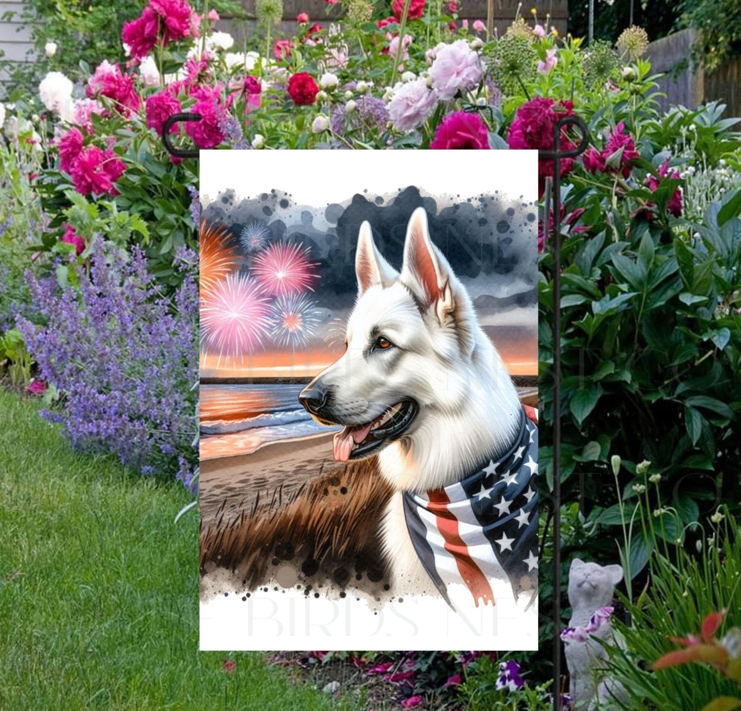 An adorable white German Shepherd Dog wearing an American Flag Bandanna on a Beach with Fireworks in the background