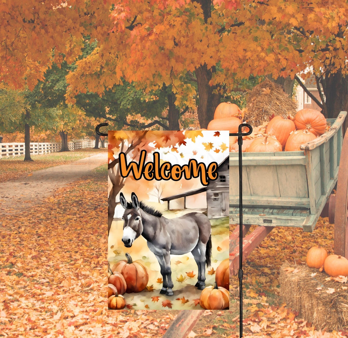 A Farmhouse Garden Flag for Fall with a Fall scene with pumpkins, a barn and a Donkey