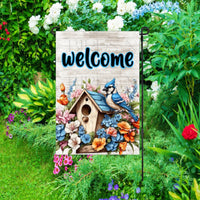 A beautiful Garden Flag with a Blue Jay bird and a birdhouse surrounded by Spring flowers.