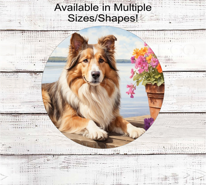 A rough Collie Dog on a dock with a flower pot overlooking a lake.