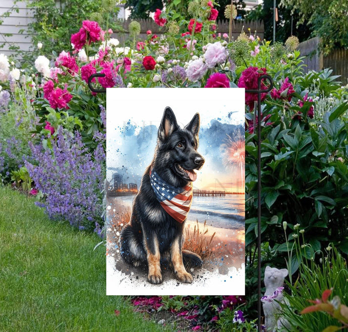 An adorable bi-colored German Shepherd Dog wearing an American Flag Bandanna on a Beach with Fireworks in the background.