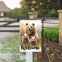 A beautiful woodland Welcome scene with a mama Grizzly Bear and her Beat Cubs.