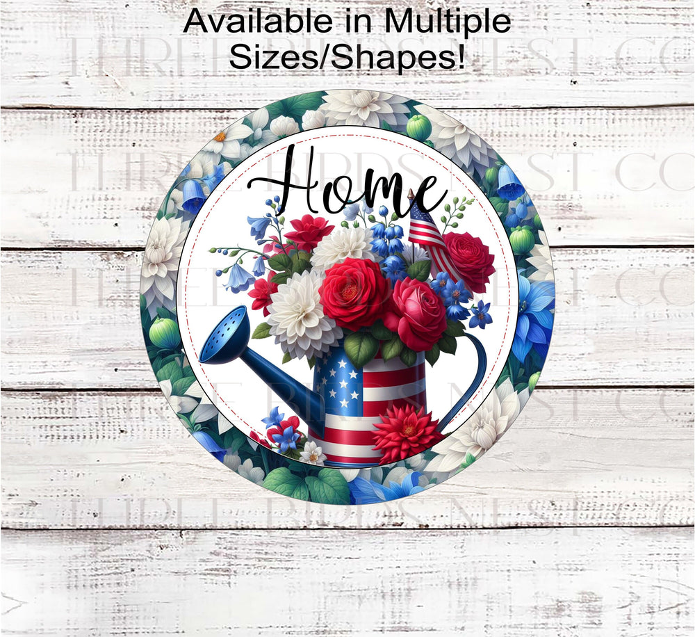 A beautiful Home Wreath Sign with a Patriotic Watering can full of red, white and blue flowers for your 4th of July decor. Dahlias, roses and blue bell flowers with an American Flag.