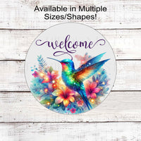 A beautiful Hummingbird surrounded by flowers in bright rainbow colors with a Welcome message.