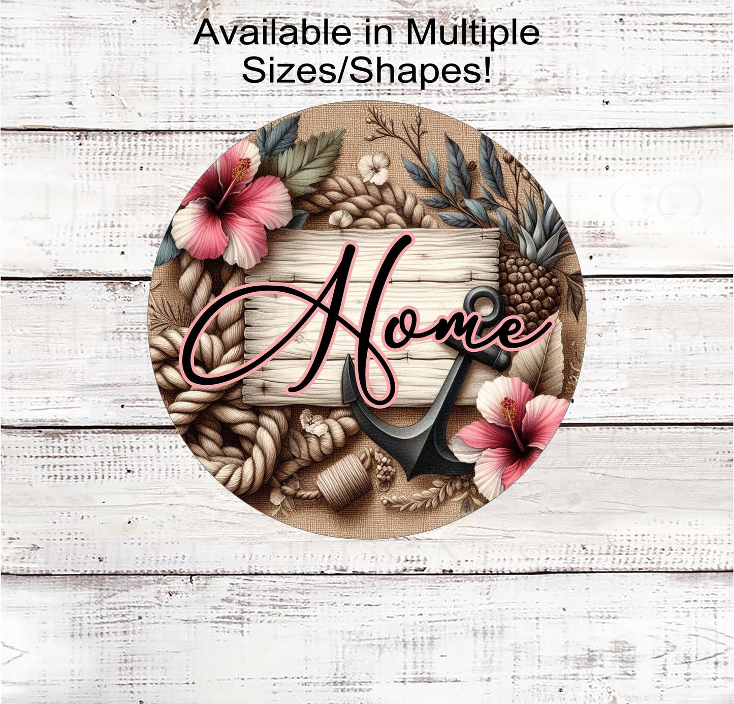 A beautiful Beach Home Sign with an anchor, pineapples and hibiscus flowers.