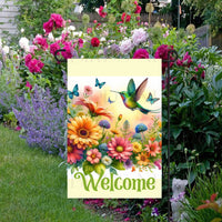 A Welcome Garden Flag with brightly colored flowers and Hummingbird.