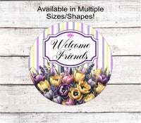 
              A Welcome Friends Wreath Sign with beautiful purple and yellow tulips.
            