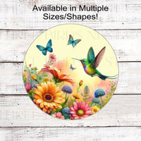 A vibrant wreath sign featuring a Hummingbird and Butterflies with beautiful flowers.