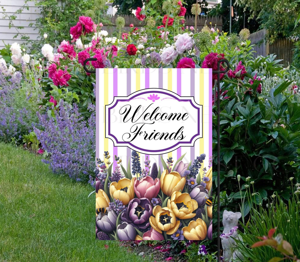 A beautiful Welcome Friends Garden Flag featuring yellow and purple Tulips and Bumble Bees.