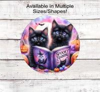 
              An adorable pair of black cats are here to celebrate Spooky Season!
            