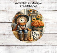 
              Fall Sweet Fall with an adorable Scarecrow surrounded by pumpkins, mums and sunflowers and holding a football.
            