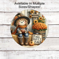 Fall Sweet Fall with an adorable Scarecrow surrounded by pumpkins, mums and sunflowers and holding a football.