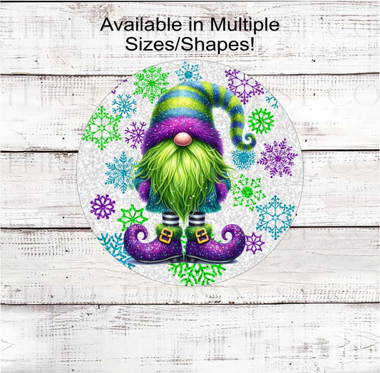 An adorable Christmas Gnome dressed in purple, lime green and teal with a lime green beard. The background is a glittery snowflake background.
