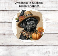 
              An adorable black Cane Corso puppy dog in a scarecrow hat with his black crow friend.
            