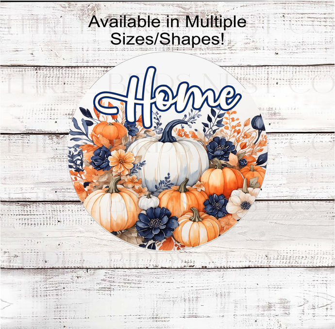 Home! A beautiful navy blue, white and orange display of pumpkins and Fall florals.