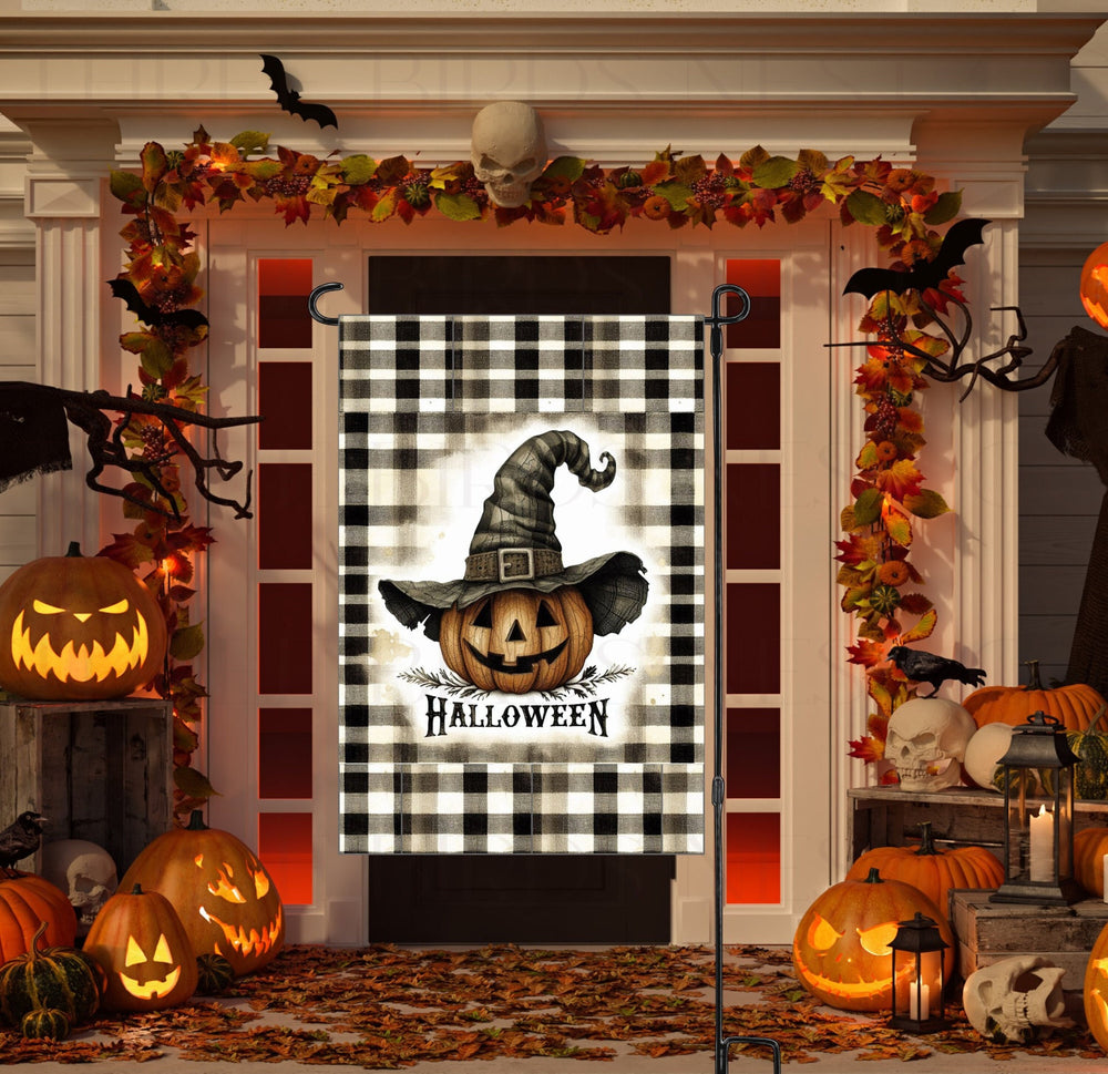 An adorable Halloween Garden Flag featuring a primitive Jack O Lantern on black and white plaid.