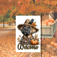 An adorable fawn Cane Corso Mastiff Puppy Dog dressed as a Scarecrow with a Welcome Fall message.