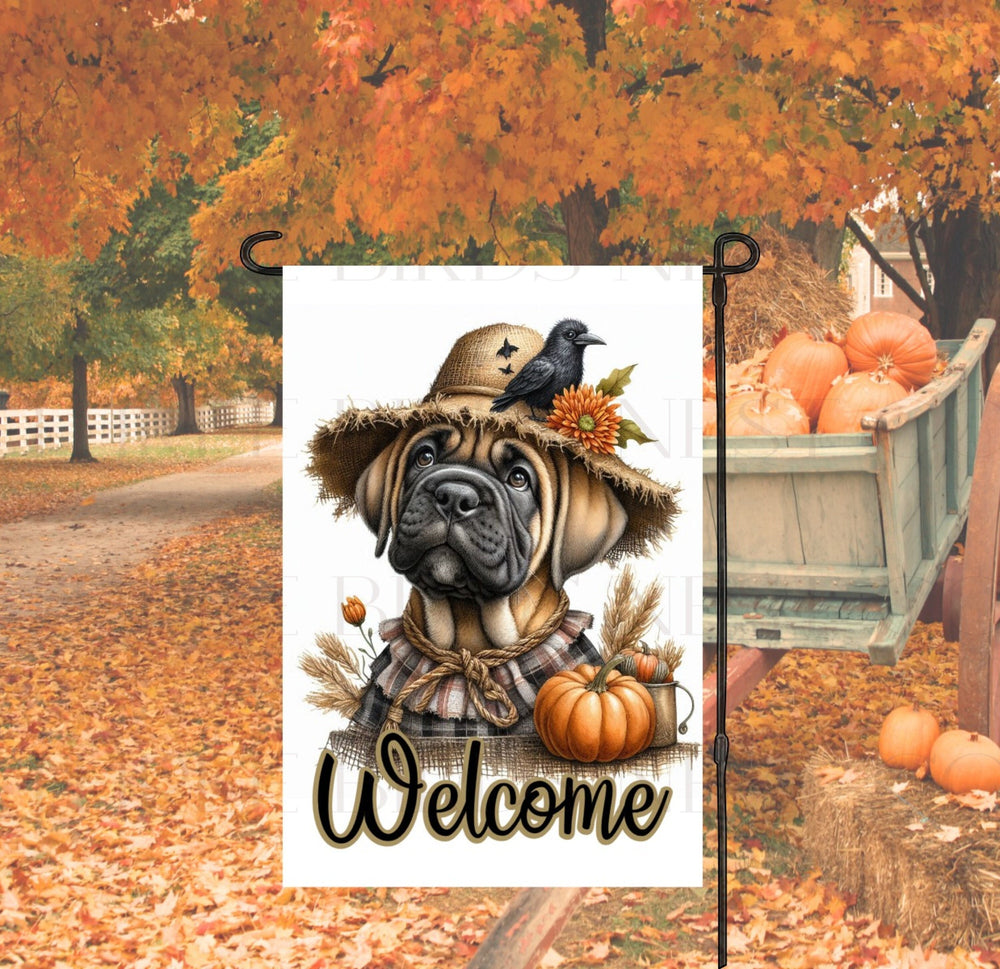 An adorable fawn Cane Corso Mastiff Puppy Dog dressed as a Scarecrow with a Welcome Fall message.