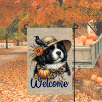 An adorable Landseer Newfoundland Puppy Dog dressed as a Scarecrow with a Welcome Fall message.