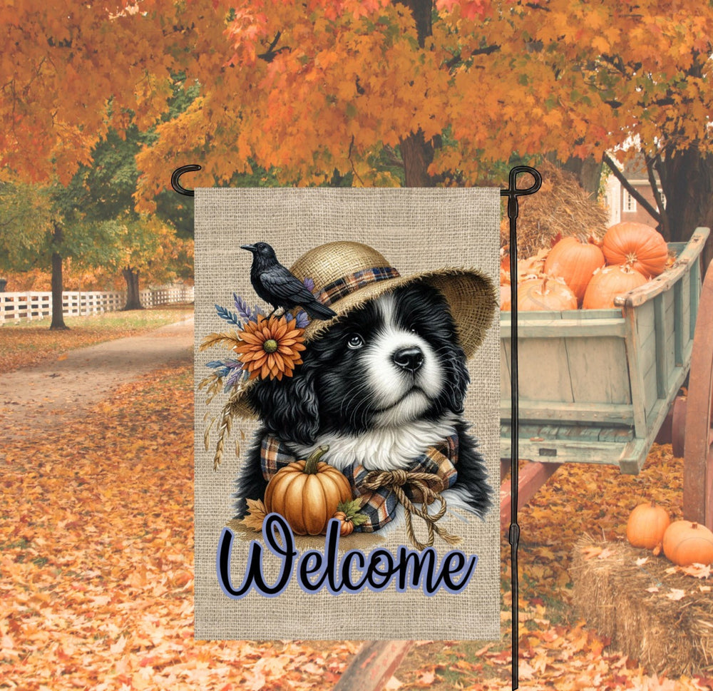 An adorable Landseer Newfoundland Puppy Dog dressed as a Scarecrow with a Welcome Fall message.