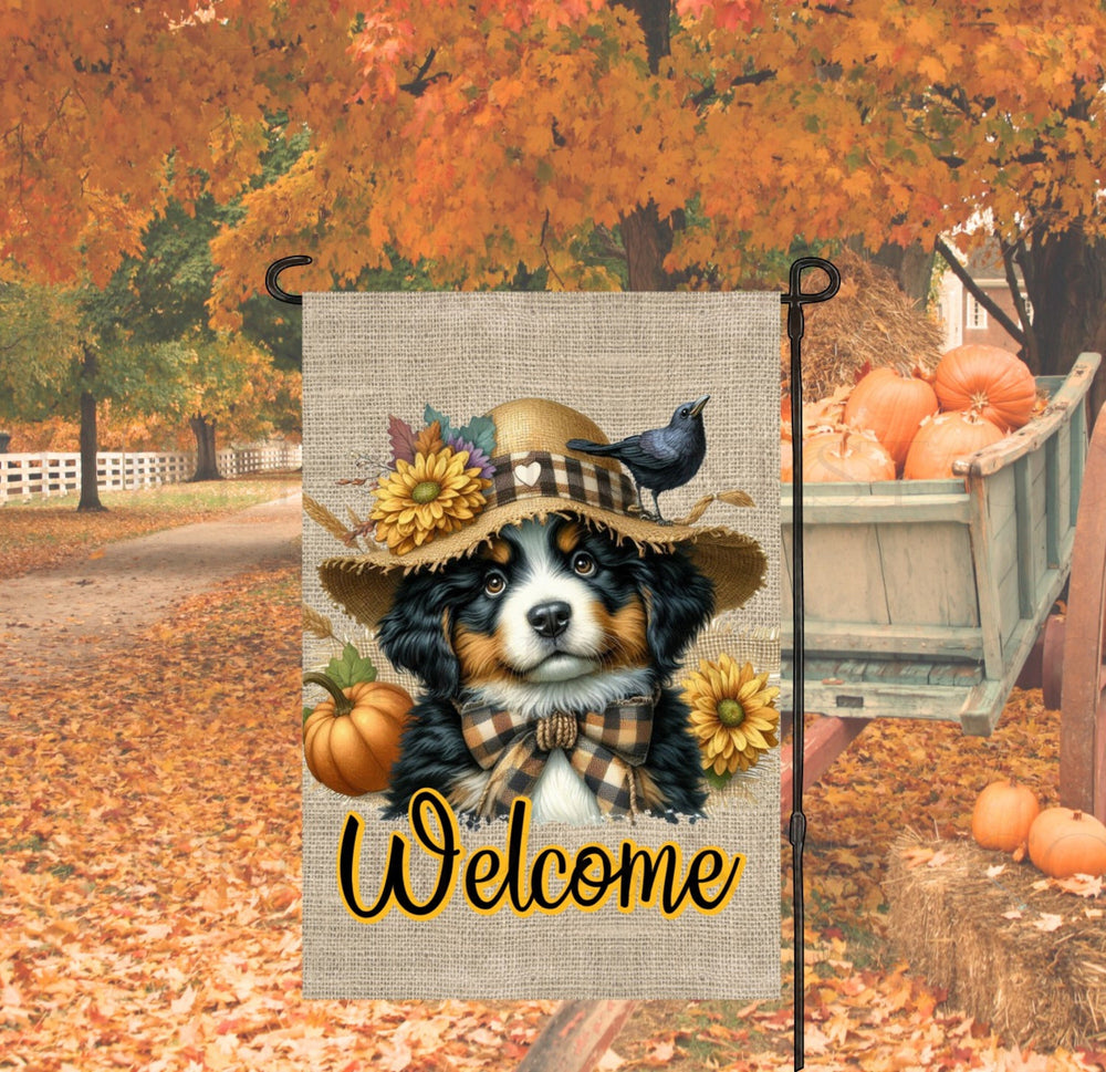 An adorable Bernese Mountain Dog Puppy dressed as a Scarecrow with a Welcome Fall message.