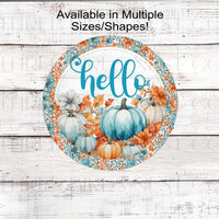 Hello! A beautiful turquoise and orange display of pumpkins and Fall florals.