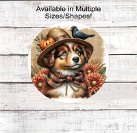 
              An adorable Australian Shepherd dog dressed as a Fall Scarecrow.
            