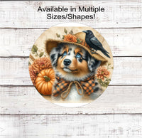 
              An adorable Australian Shepherd dog dressed as a Fall Scarecrow.
            