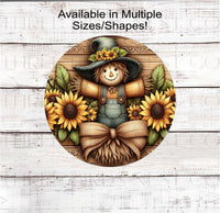 
              A beautiful Fall Wreath Sign featuring a faux 3-D carving of an adorable Scarecrow surrounded by sunflowers.
            