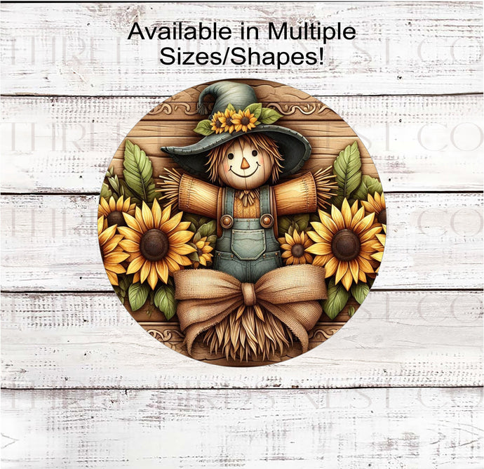 A beautiful Fall Wreath Sign featuring a faux 3-D carving of an adorable Scarecrow surrounded by sunflowers.