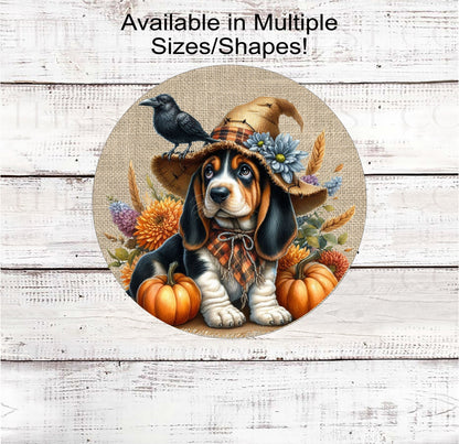 An adorable Basset Hound puppy dog dressed as a Fall Scarecrow.
