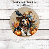 An adorable Basset Hound puppy dog dressed as a Fall Scarecrow.