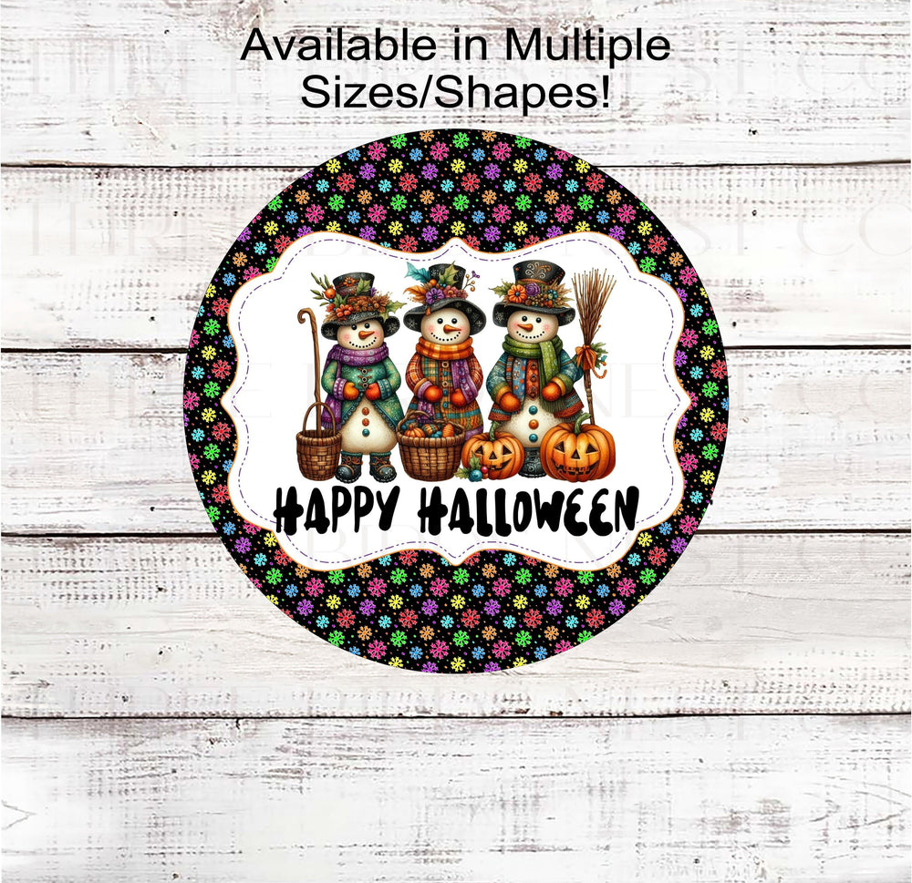 An adorable trio of Snowmen, all dressed up and ready for Halloween- all on a brightly colored Snowflakes background.