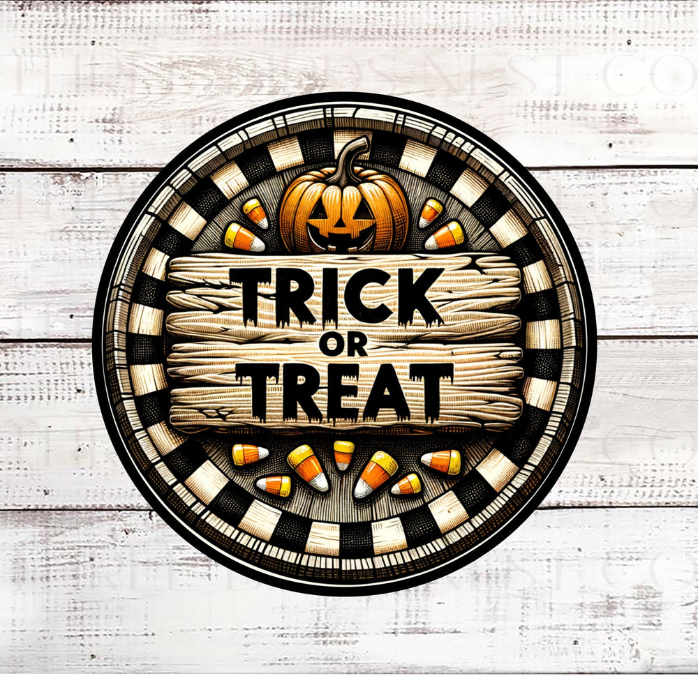 A Trick or Treat sign with Candy Corn and and Jack O Lantern