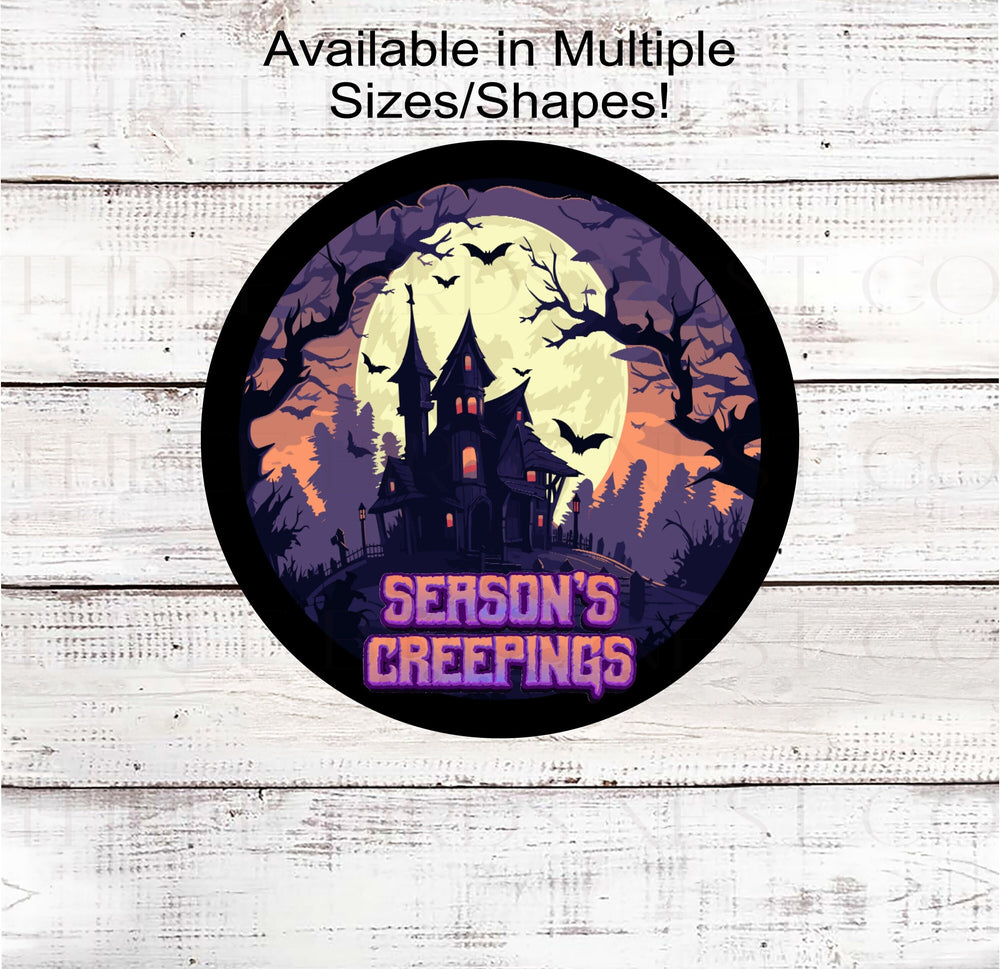 A Haunted House with Purple that says "Season's Creepings"