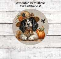 
              An adorable English Springer Spaniel puppy dog in a scarecrow hat with his black crow friend.
            