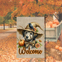 An adorable Irish Wolfhound Dog dressed as a Scarecrow with a Welcome Fall message.