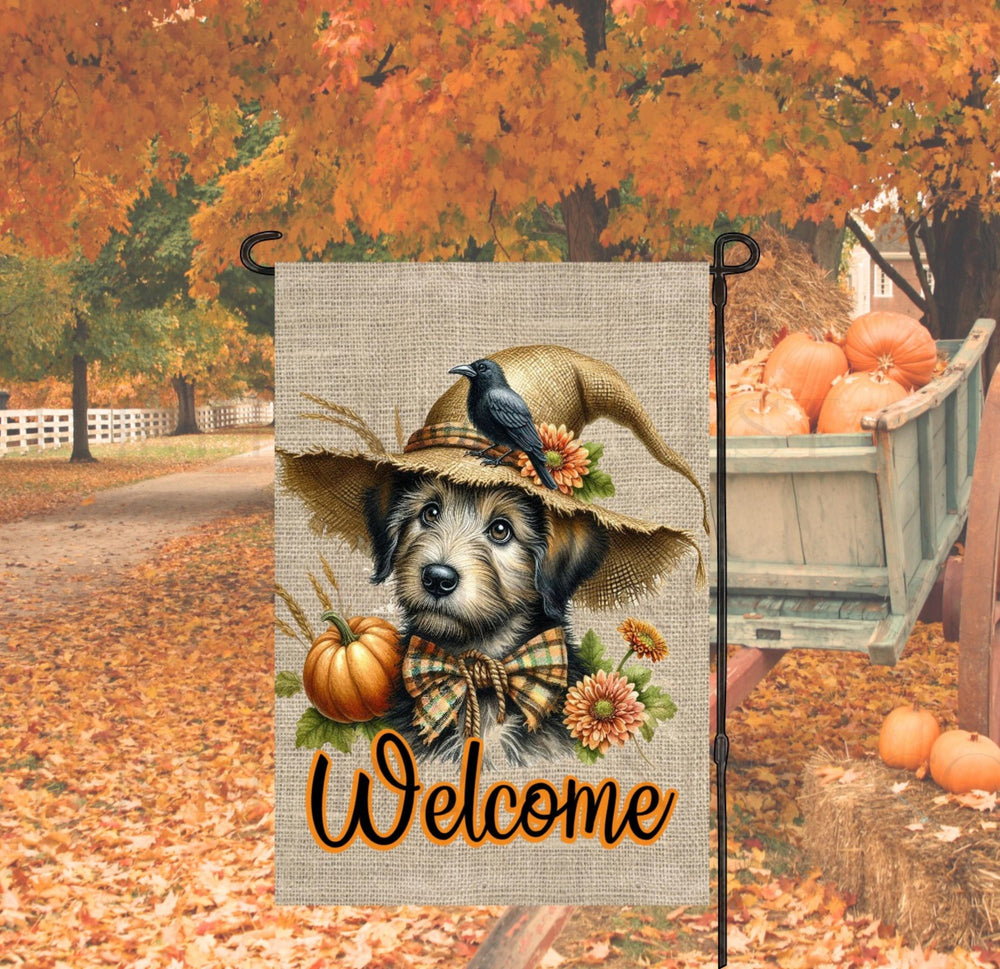 An adorable Irish Wolfhound Dog dressed as a Scarecrow with a Welcome Fall message.