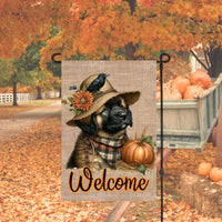 An adorable Leonberger Puppy Dog dressed as a Scarecrow with a Welcome Fall message.