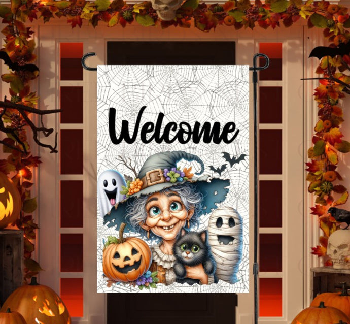 An adorable Halloween Garden Flag featuring a Witch and her friends on a spider web background.