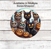 
              A spooky group of Zombie Halloween cats with Nightmare style jack o lanterns.
            