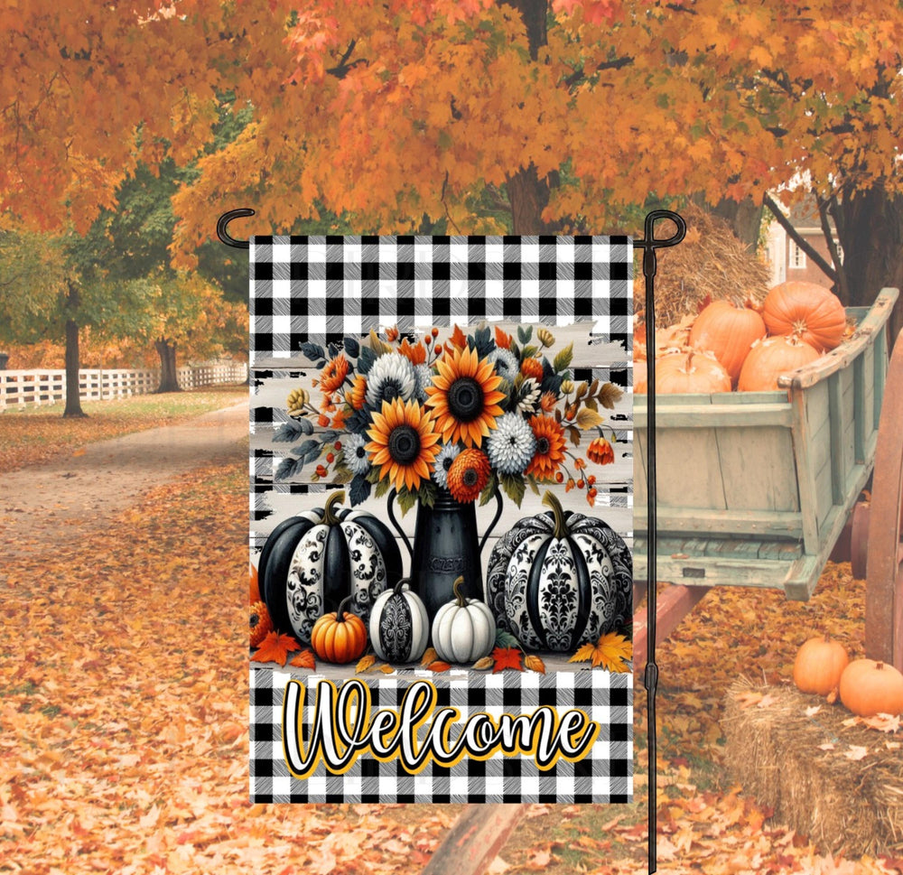 A perfect Fall Garden Flag featuring black and white Chinoiserie Pumpkins with sunflowers and Autumn Leaves.