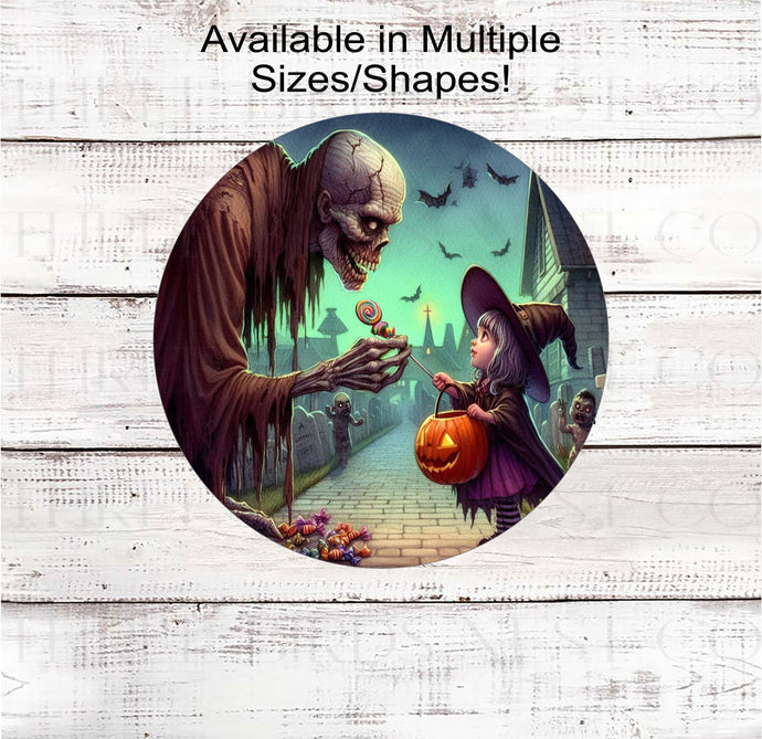 An adorable Halloween sign with a Witch Trick or Treater offering a lollipop to a monster.