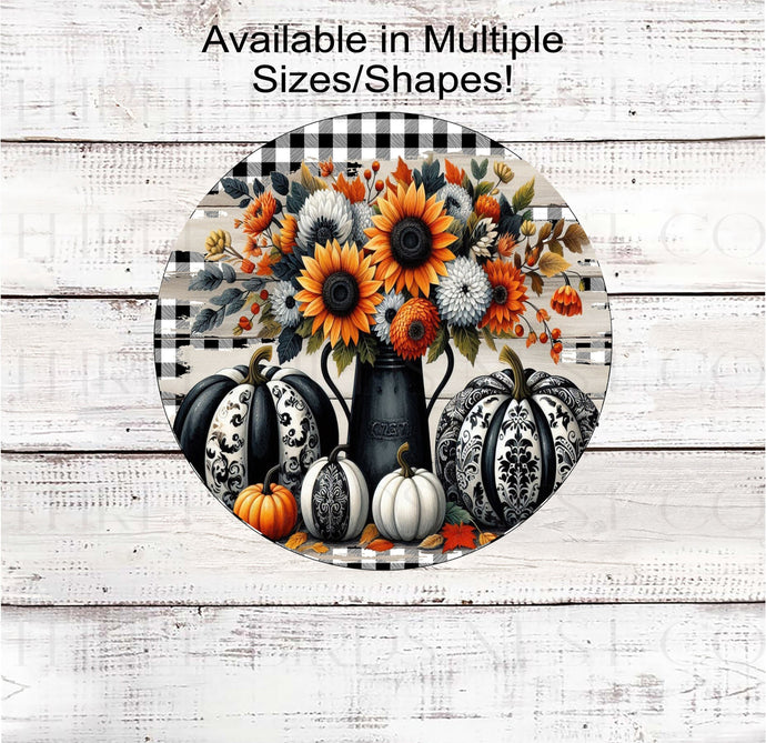 An adorable Fall Wreath Sign featuring black and white Chinoiserie Pumpkins with sunflowers and leaves on buffalo plaid background.