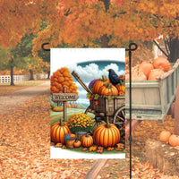 A beautiful Autumn Garden Flag with a Welcome sign, a pumpkin wagon with a black Crow and colorful Chrysanthemums.