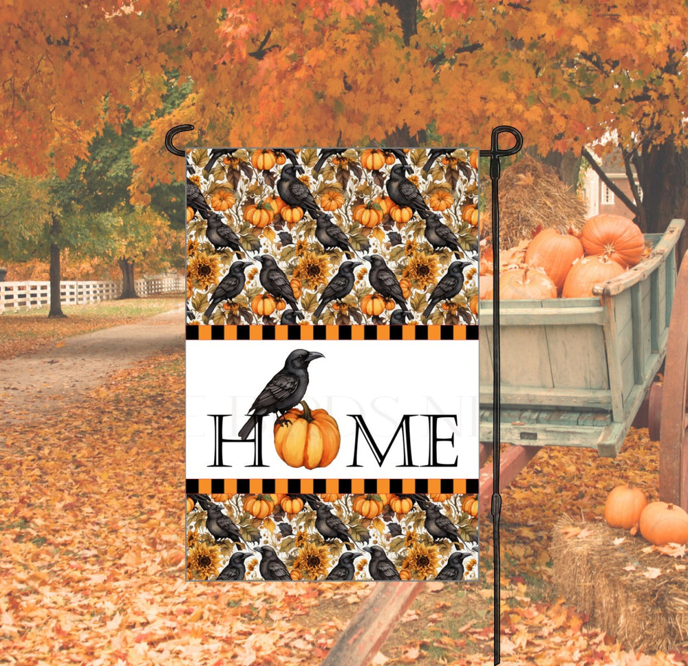 A beautiful primitive Fall Home Garden Flag with a black Crow and Pumpkin pattern.