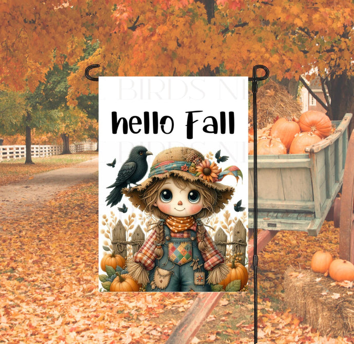 An adorable Scarecrow with his black Crow friend saying hello Fall!